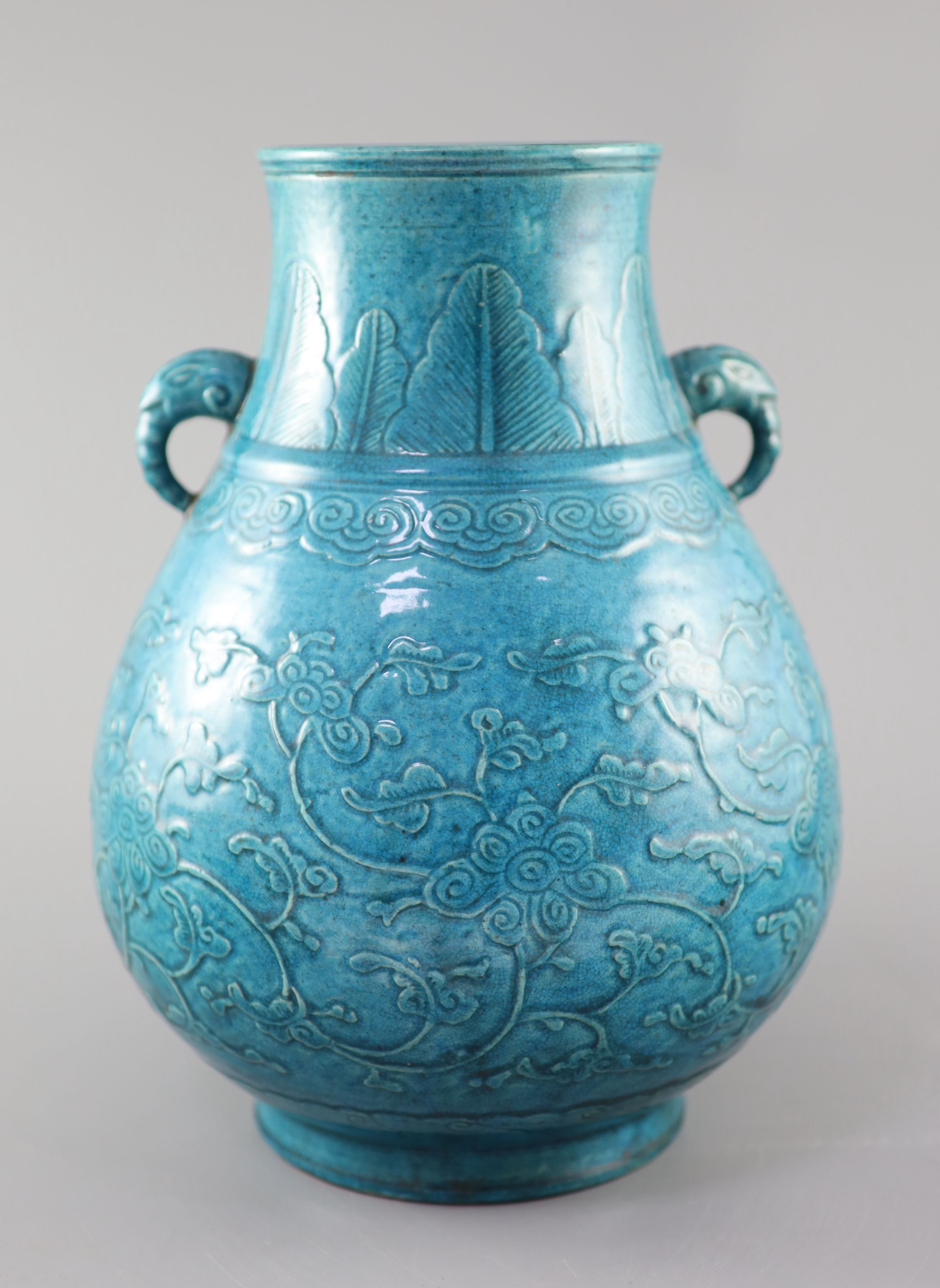 A Chinese turquoise glazed vase, Hu, late Qing dynasty, 31cm high. overall height 41cm.